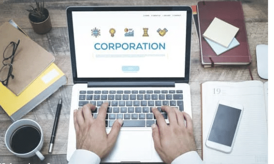 Picture displaying a computer with the word corporation